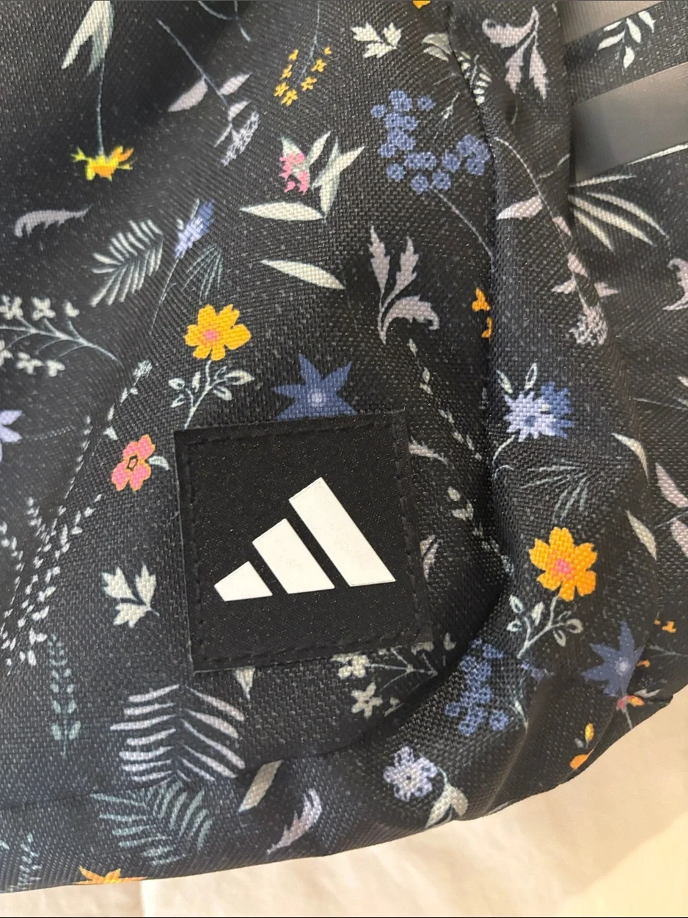 adidas Black Floral Print Backpack with Yellow, Pink and Blue Flowers